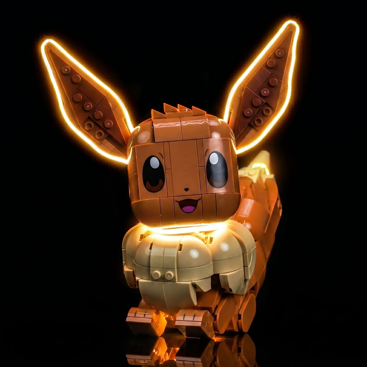 LEGO® Pokémon Eevee #72151 display lighting in a dark room, with the USB-powered LED light kit