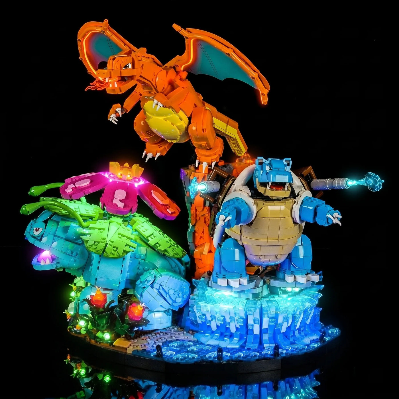 LEGO® Pokémon Venusaur Charizard Blastoise #72153 display lighting in a dark room, with the premium LED light kit
