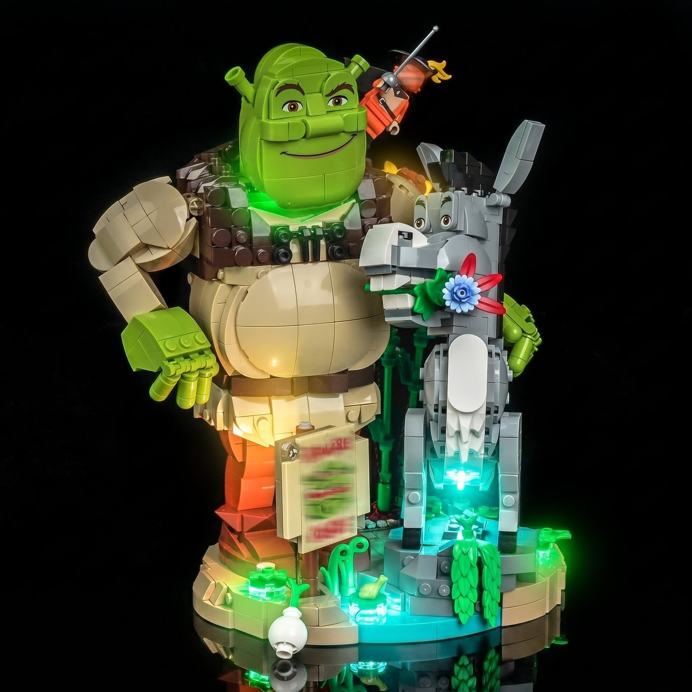 LEGO® Shrek, Donkey & Puss in Boots #72423 display lighting in a dark room, with the USB-powered LED light kit