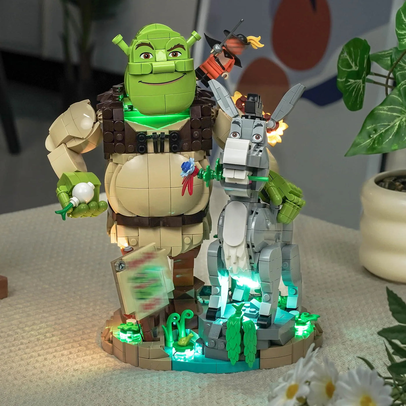 fully illuminated on display: Bright My Bricks custom LED lighting for LEGO® Shrek, Donkey & Puss in Boots #72423