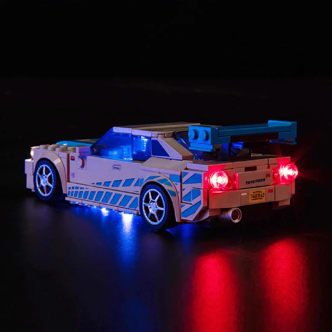 LEGO Speed Champions 2 Fast 2 Furious Nissan Skyline GT-R (R34) #76917 illuminated at night