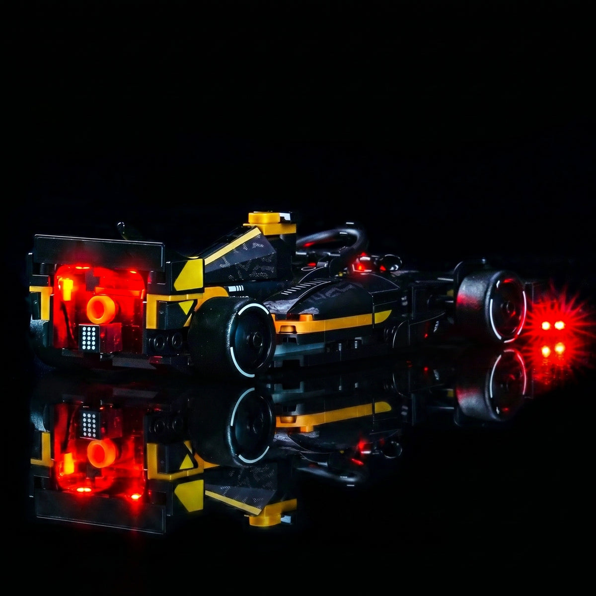 LEGO® Speed Champions APXGP Team Race Car from F1 The Movie #77252 front view fully lit, with the light kit