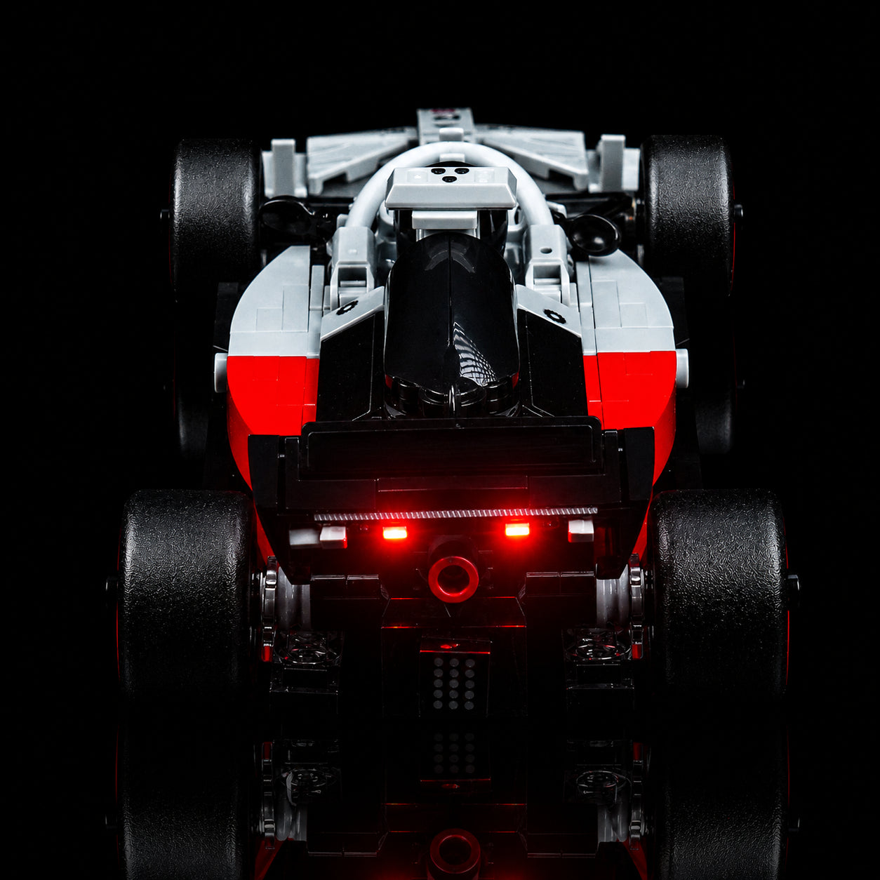 LEGO® Speed Champions Audi Revolut F1 Team R26 Race Car #77259 front view fully lit, with the LED lighting kit