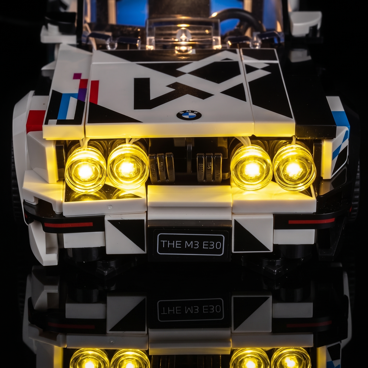 LED lights for LEGO® Speed Champions BMW M3 (E30) #77263, lit on a dark shelf