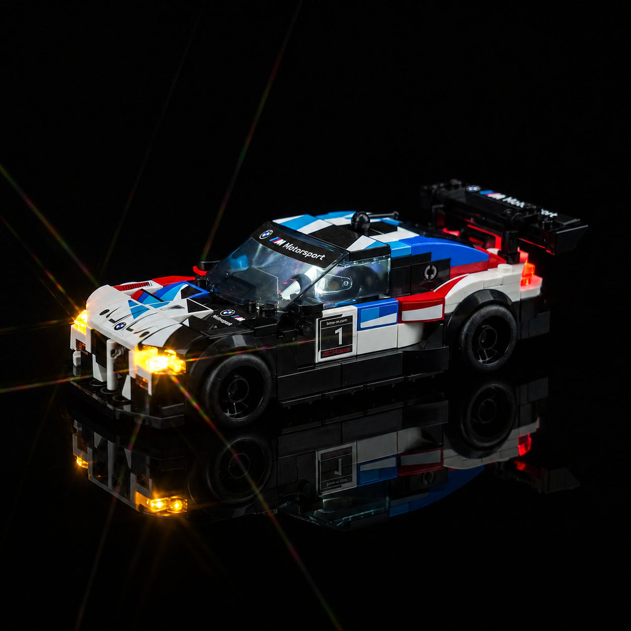 LEGO® Speed Champions BMW M4 GT3 & BMW M Hybrid V8 Race Cars #76922 installed and glowing, with the LED light kit
