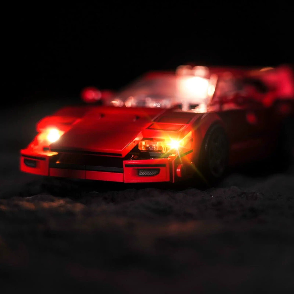 LEGO® Speed Champions Ferrari F40 Supercar #76934 LED kit powered on, with the LED lighting kit