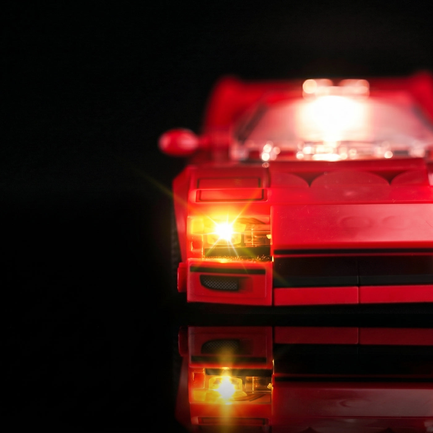 LEGO® Speed Champions Ferrari F40 Supercar #76934 front view fully lit, with the LED light kit