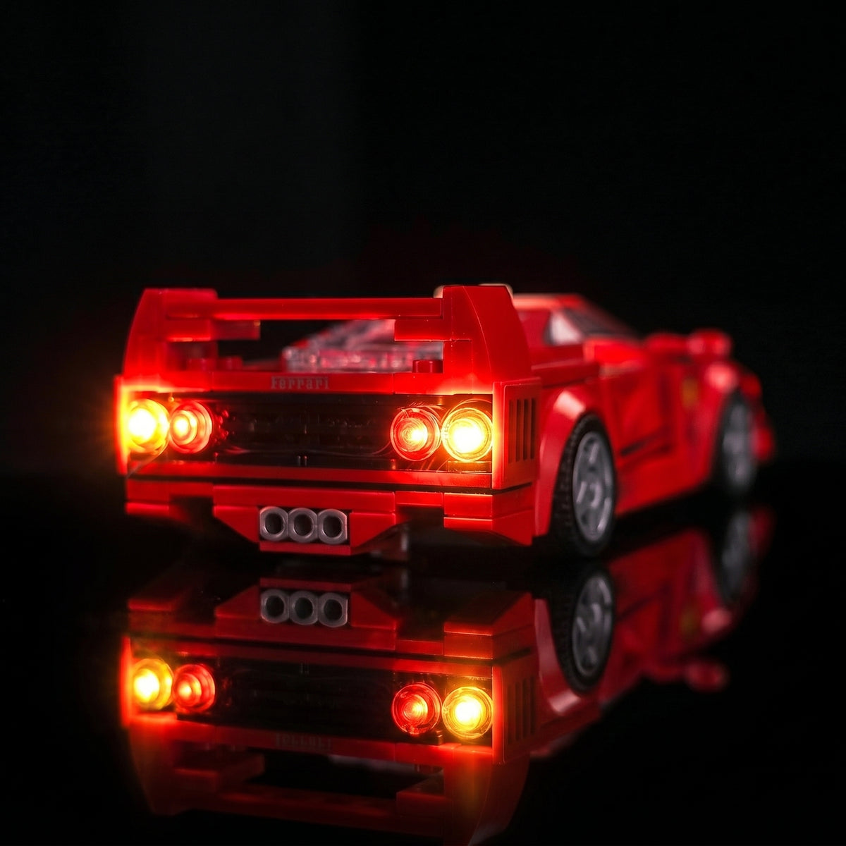 LEGO® Speed Champions Ferrari F40 Supercar #76934 side angle with lights on, with the DIY LED light kit