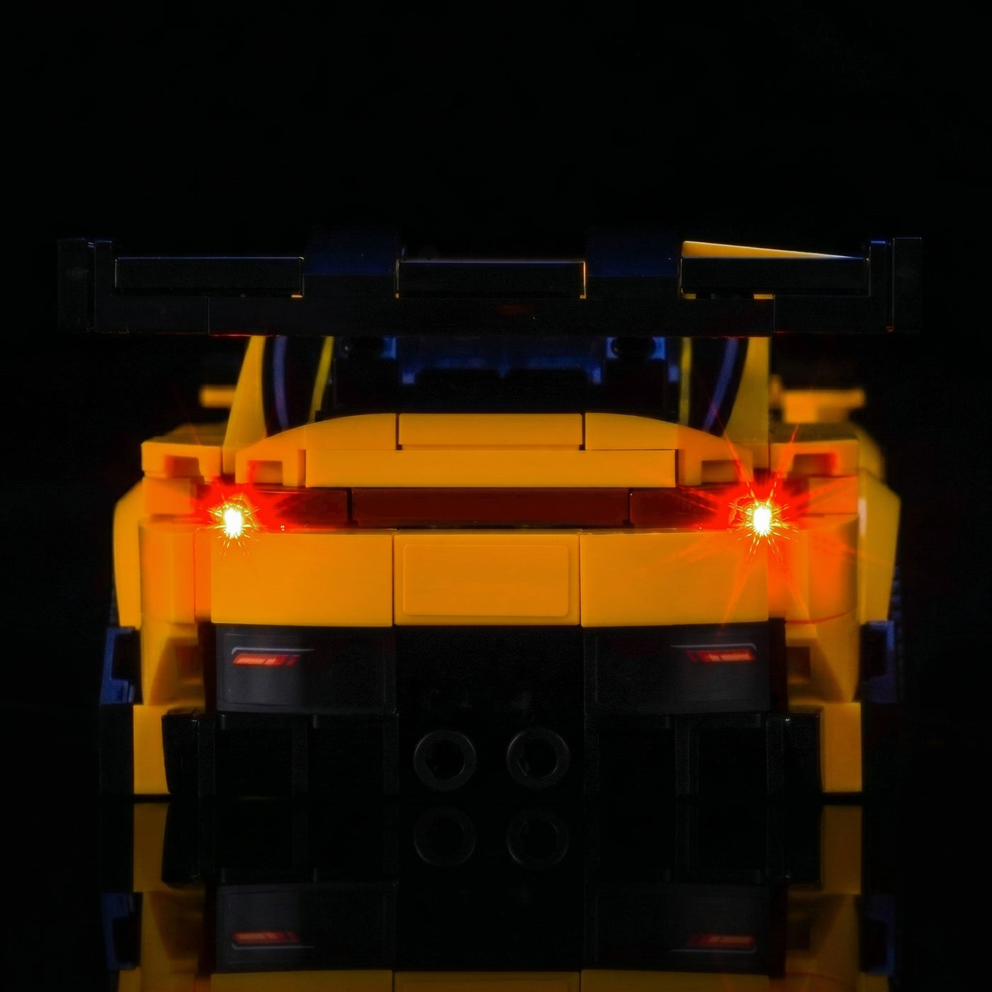 LEGO® Speed Champions Porsche 911 GT3 RS Super Car #77239 display lighting in a dark room, with the LED light kit