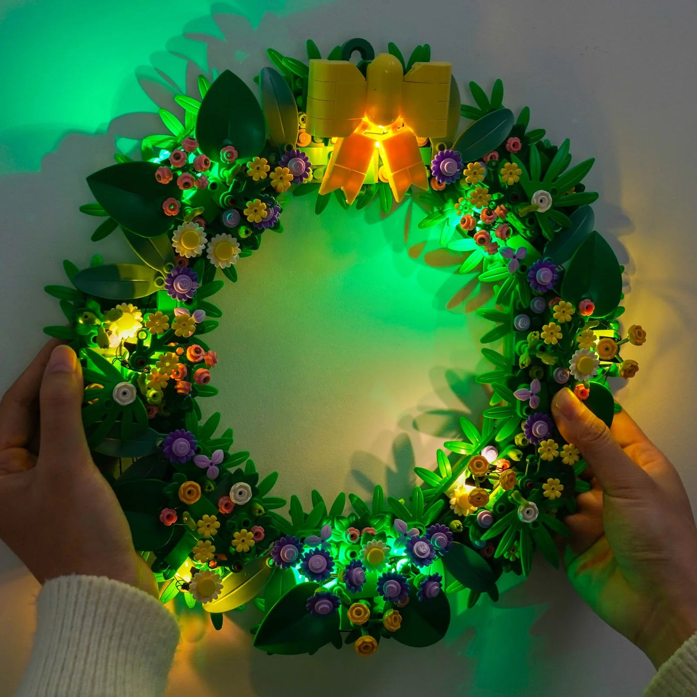 LEGO® Spring Wreath #40957 side angle with lights on, with the LED light kit