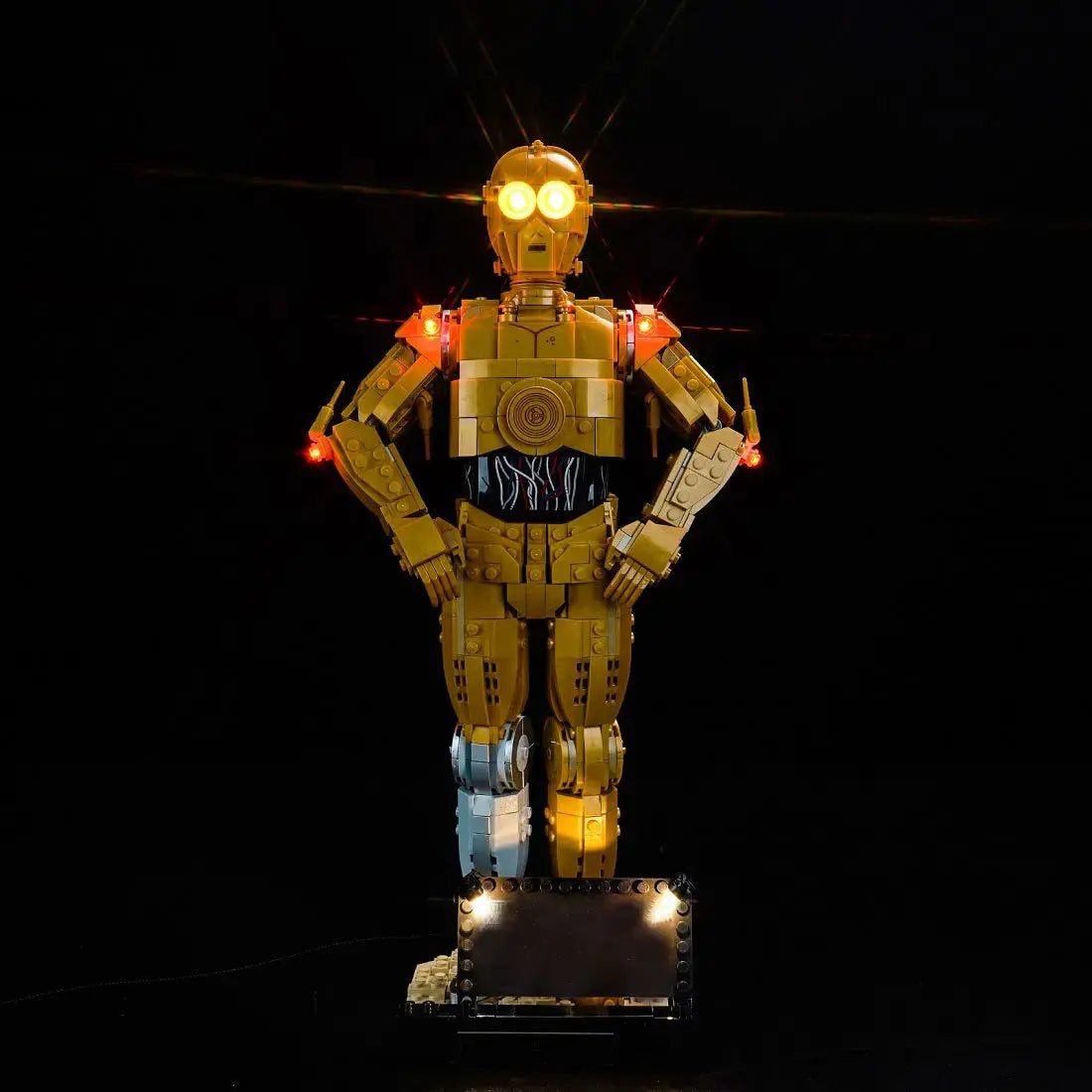 LEGO Star Wars C-3PO #75398 illuminated at night