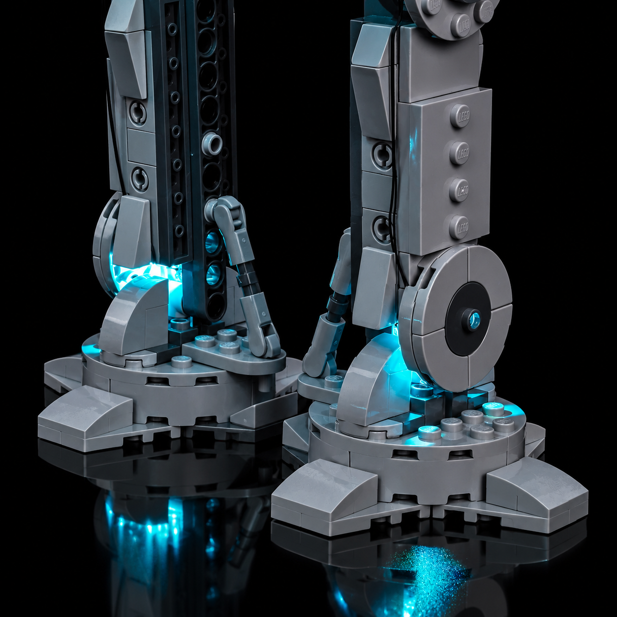 Close-up of the lit feet and ankle joints of LEGO Imperial Remnant AT-AT 75454, cyan glow on the ground