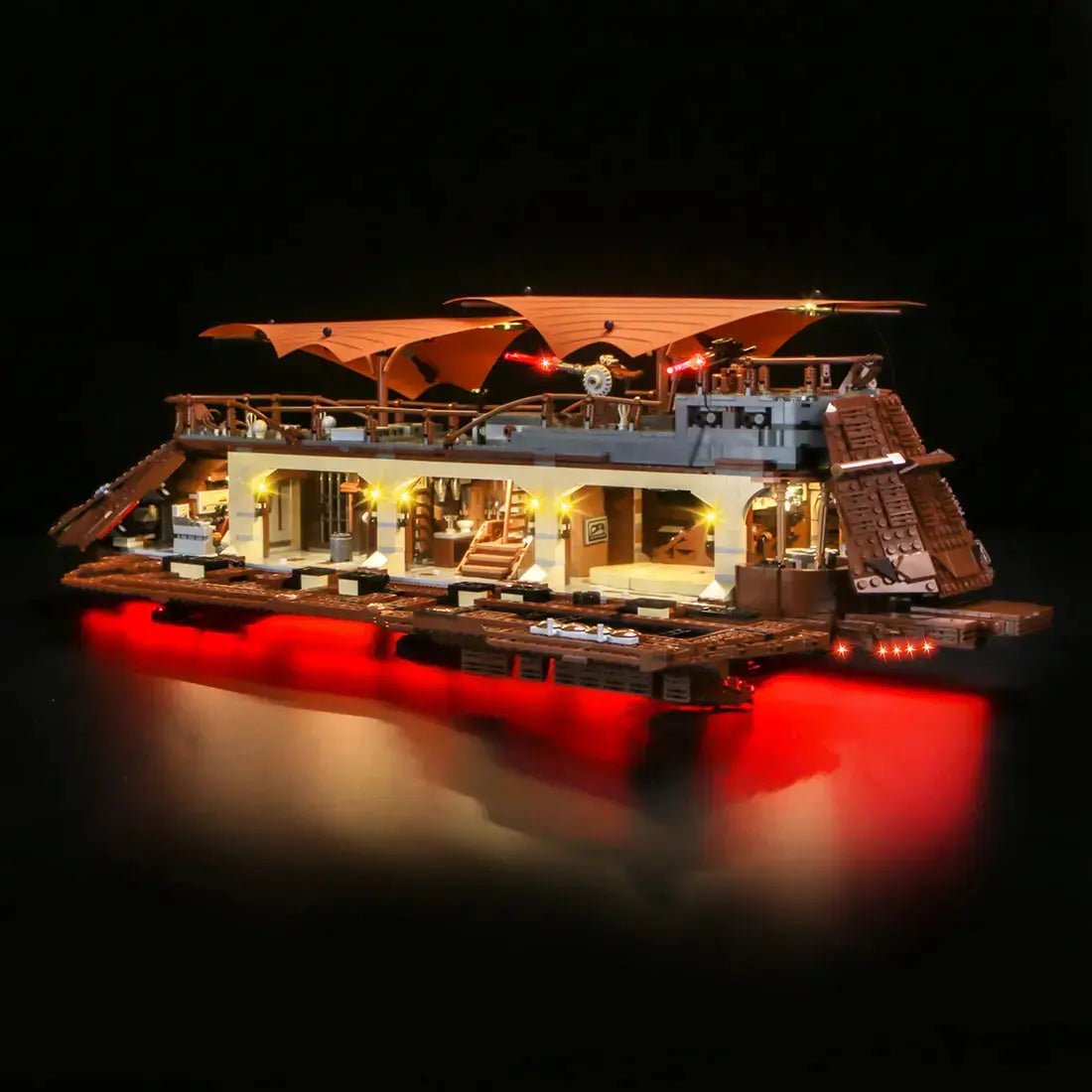 LEGO Star Wars Jabba's Sail Barge #75397 illuminated at night