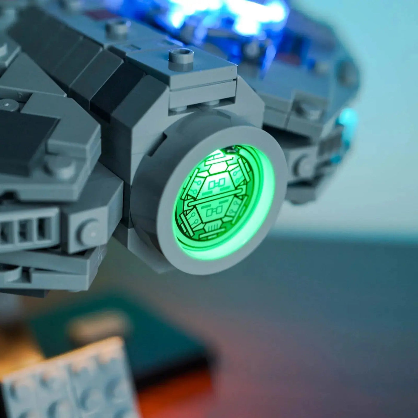 LEGO® Star Wars Millennium Falcon #75375 fully illuminated on display, with the custom LED lighting