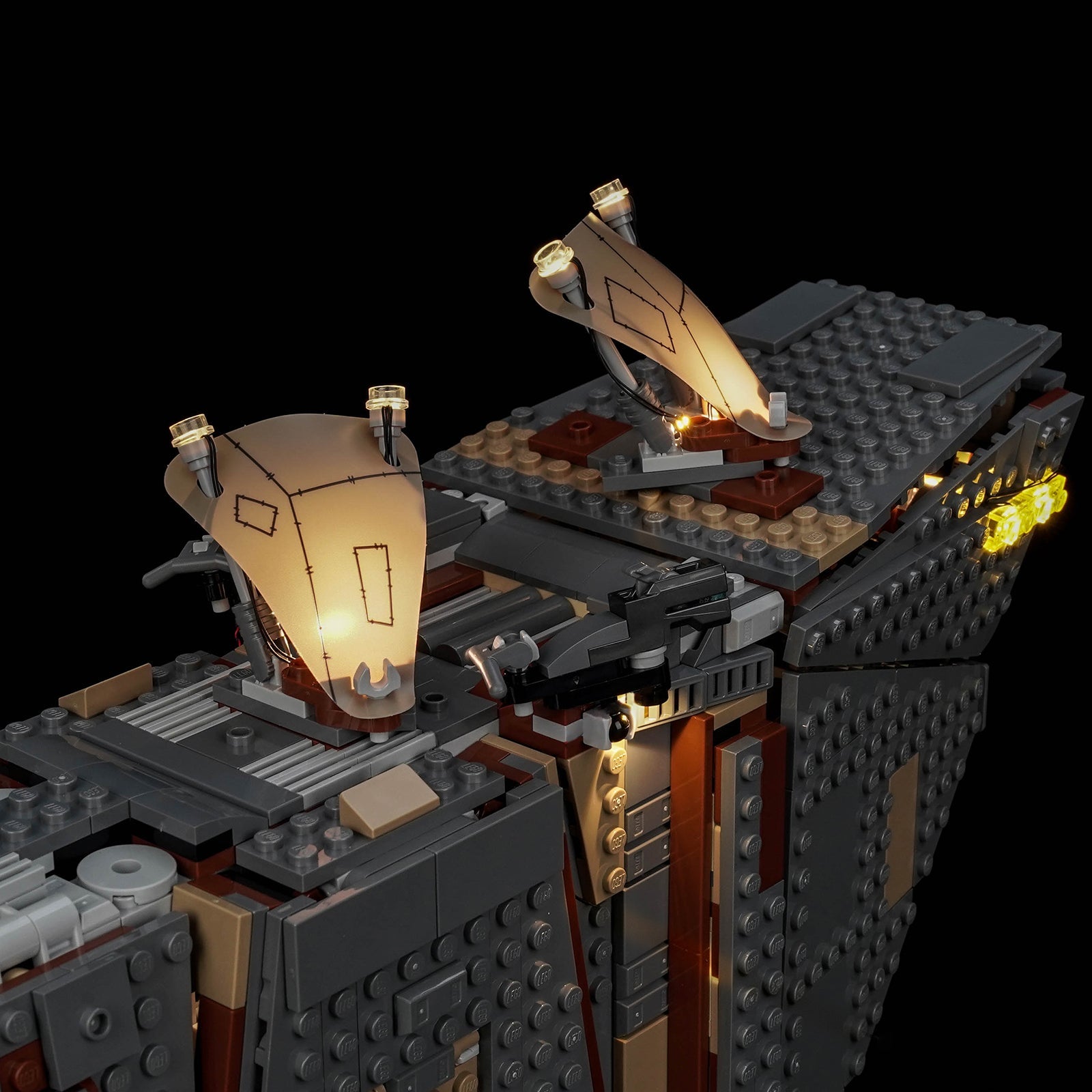 LEGO® Star Wars Offworld Sandcrawler and Mudhorn #75453 display lighting in a dark room, with the premium LED light kit
