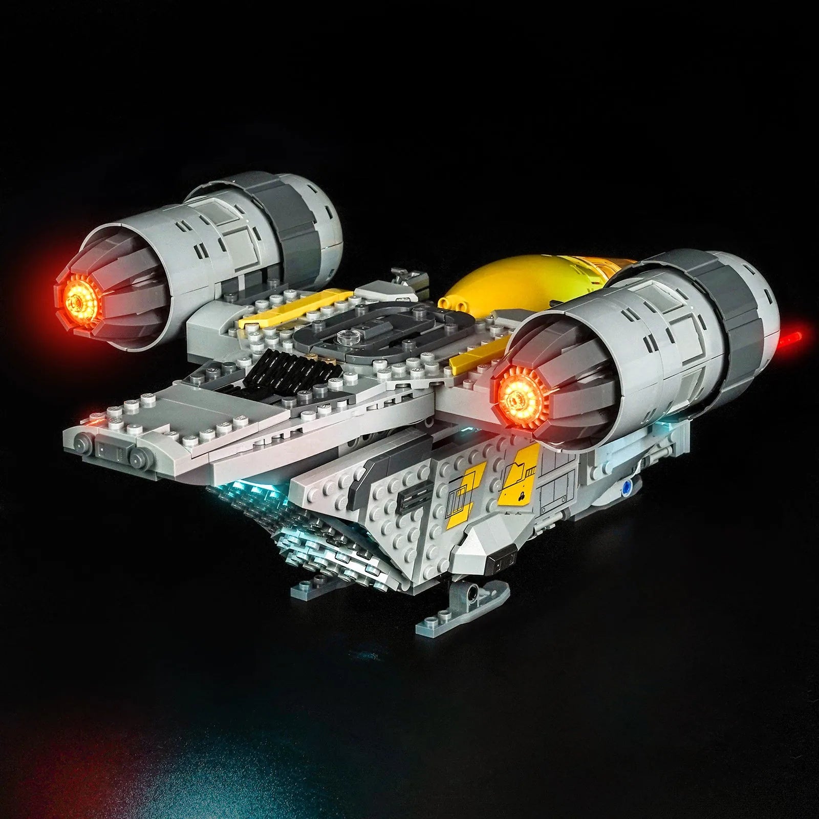 LEGO Star Wars The Razor Crest #75447 illuminated at night