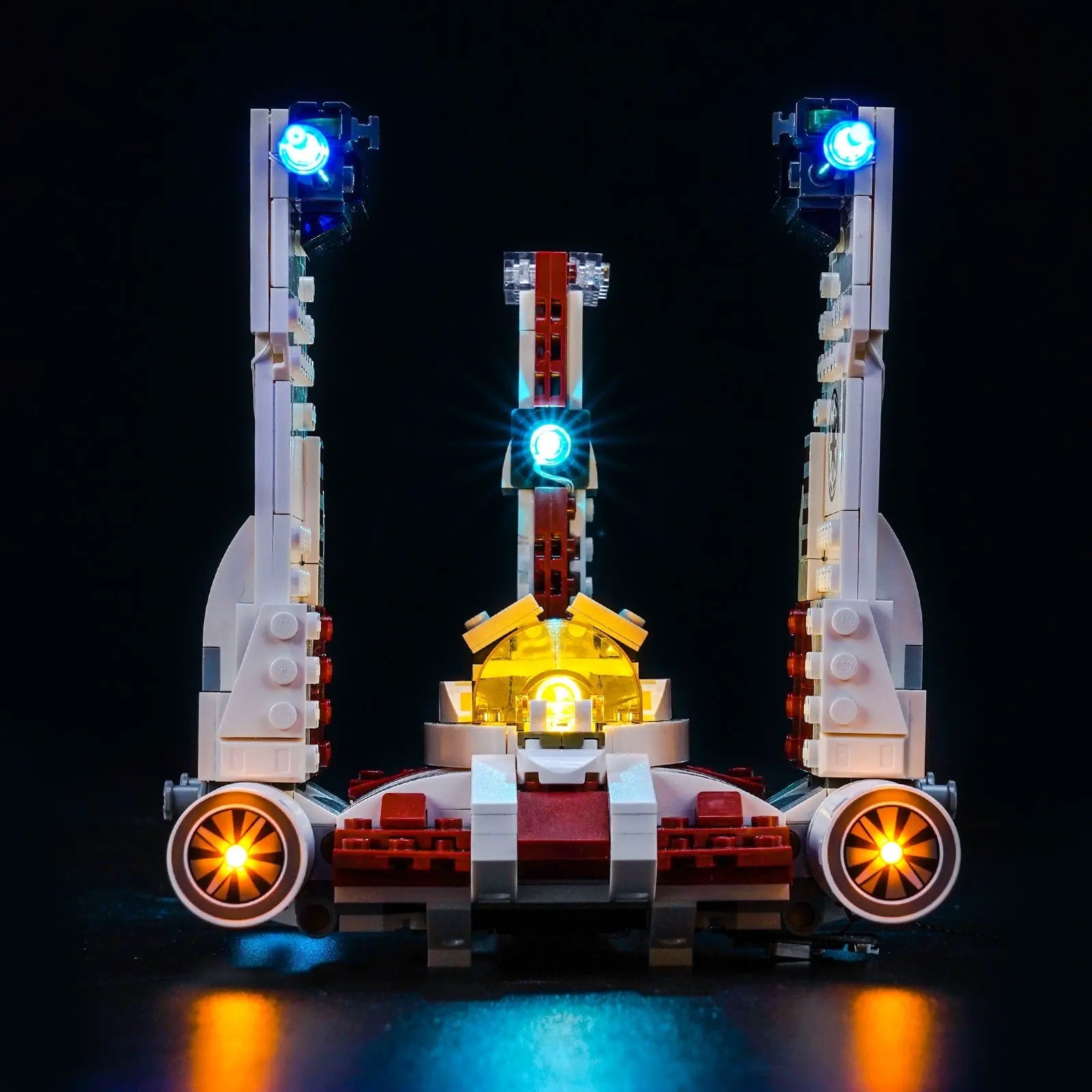 LEGO Star Wars V-19 Torrent Starfighter #75432 illuminated at night