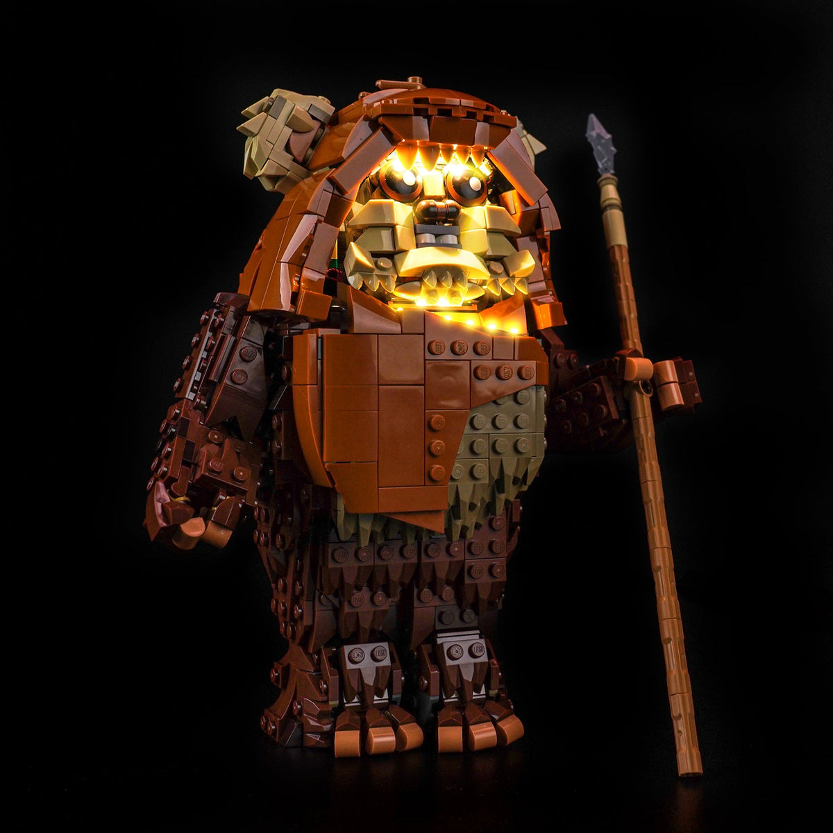 LEGO® Star Wars Wicket the Ewok #75430 fully illuminated on display, with the LED lights