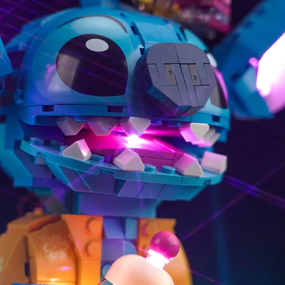 side angle with lights on: Bright My Bricks LED light kit for LEGO® Stitch #43249