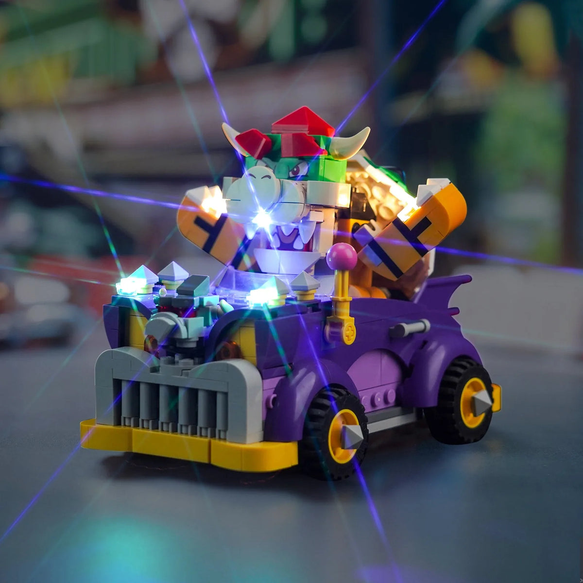 LEGO® Super Mario Bowser's Muscle Car Expansion Set #71431 — fully illuminated on display (custom LED lighting)