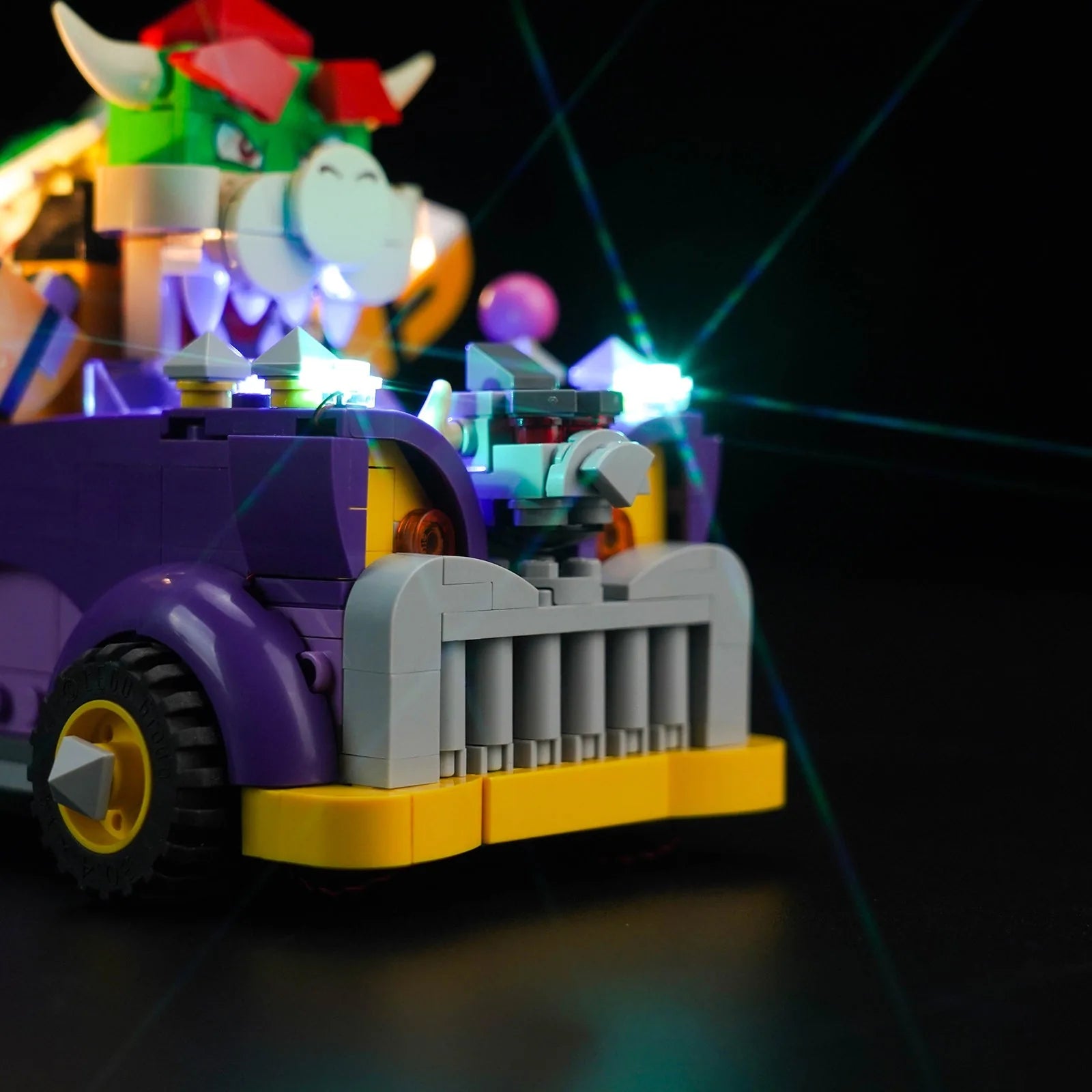 LEGO® Super Mario Bowser's Muscle Car Expansion Set #71431 — fully illuminated on display (RGB LED light kit)