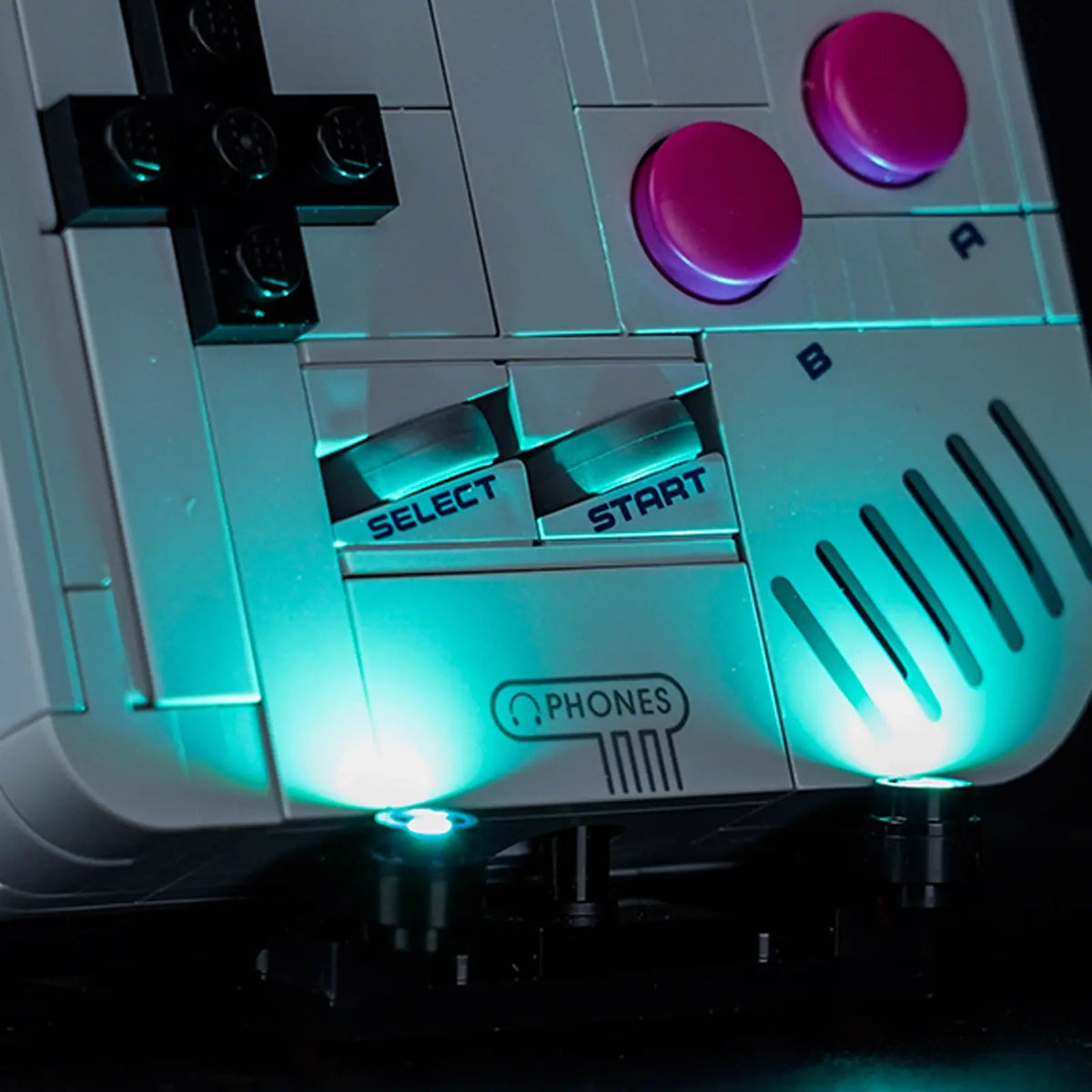 LEGO® Super Mario Game Boy #72046 fully illuminated on display, with the display light kit