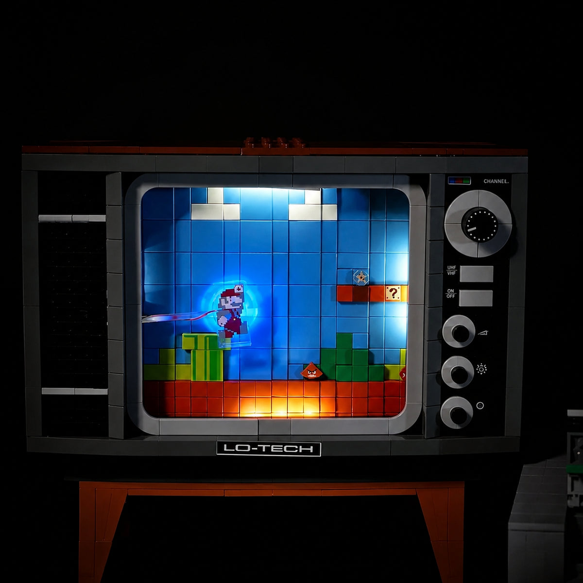 LEGO® Super Mario Nintendo Entertainment System #71374 — installed and glowing (USB-powered LED light kit)