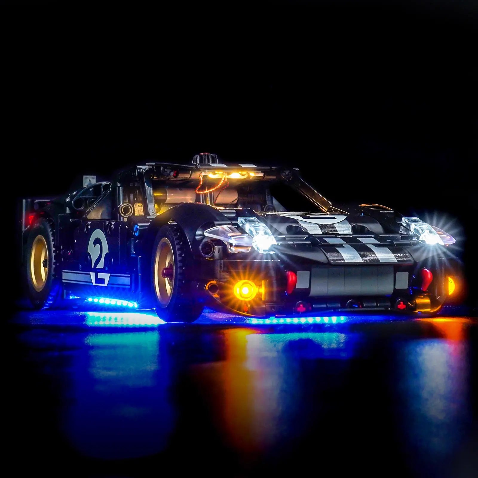 LEGO Technic 1966 Ford GT40 MKII Race Car #42223 illuminated at night