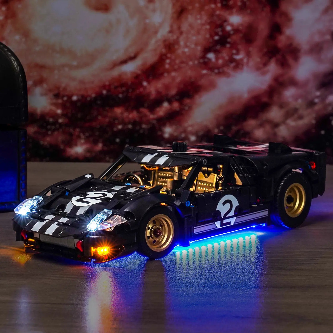 LEGO® Technic 1966 Ford GT40 MKII Race Car #42223 — front view fully lit (LED lights)