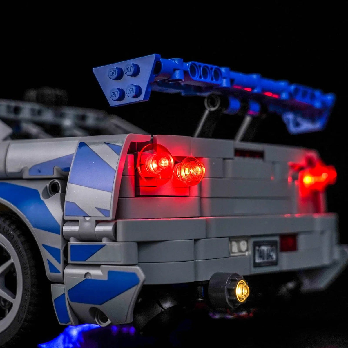 LEGO® Technic 2 Fast 2 Furious Nissan Skyline GT-R (R34) #42210 night-mode display glow, with the display light kit