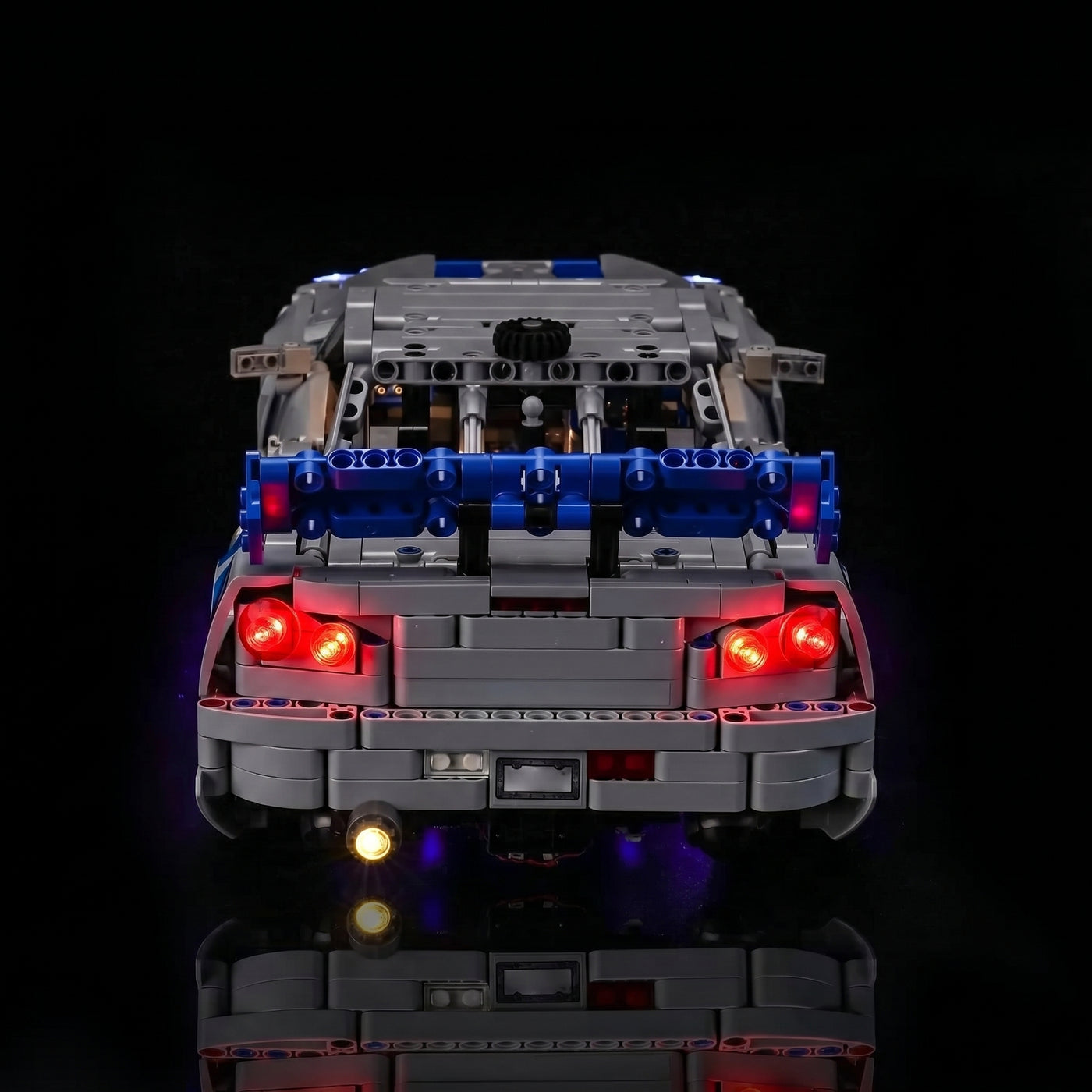 LEGO® Technic 2 Fast 2 Furious Nissan Skyline GT-R (R34) #42210 LED kit powered on, with the premium LED light kit