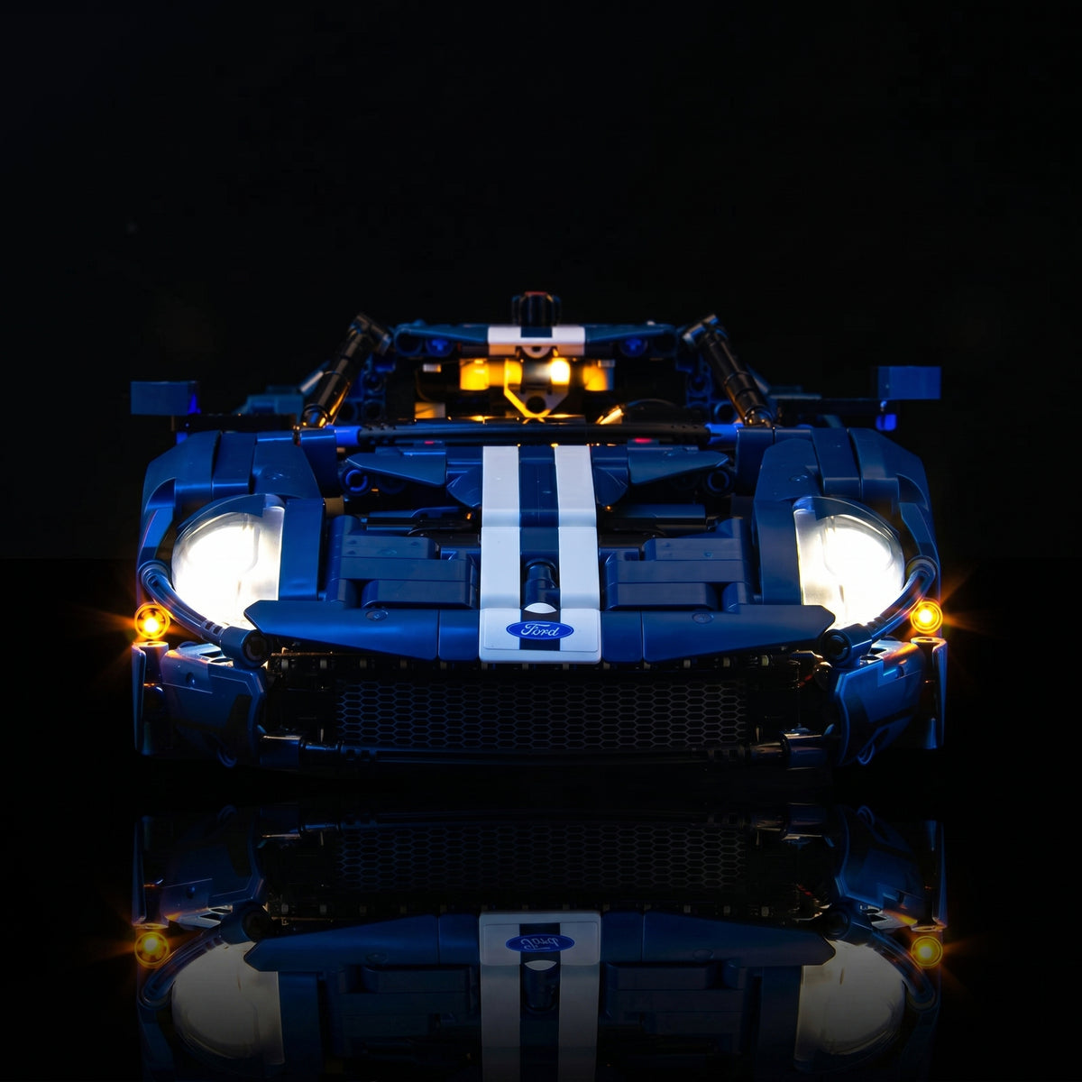 LEGO® Technic 2022 Ford GT #42154 front view fully lit, with the LED light kit