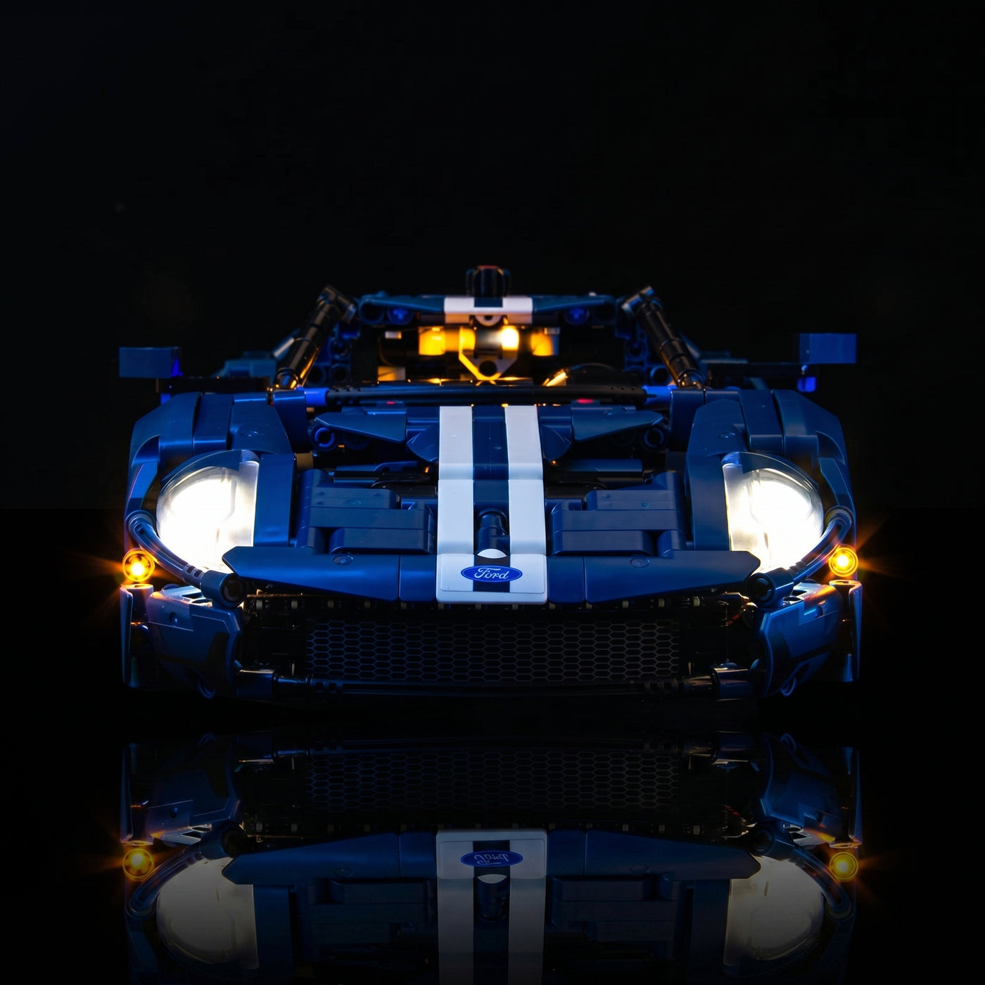 LEGO® Technic 2022 Ford GT #42154 front view fully lit, with the LED light kit