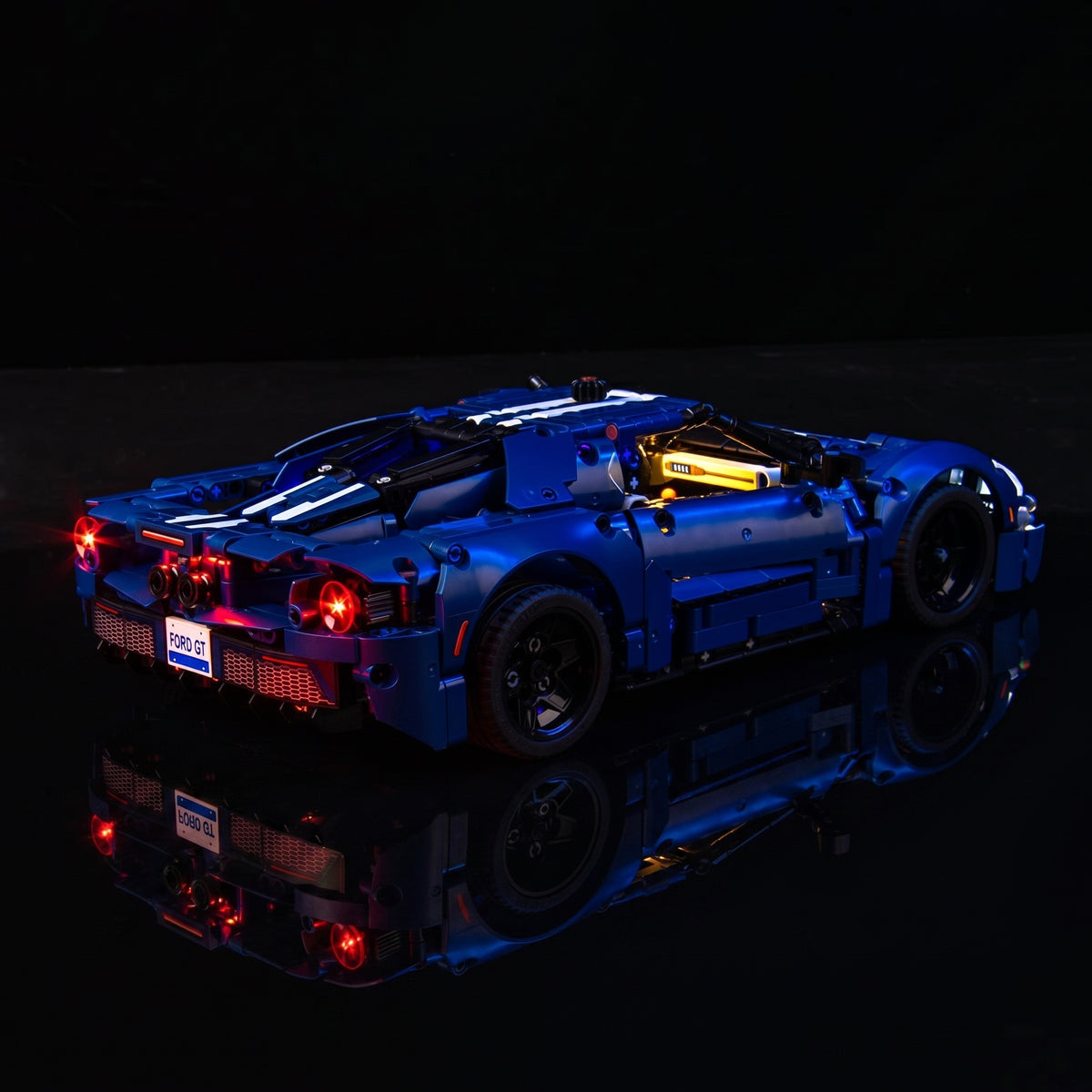 LEGO® Technic 2022 Ford GT #42154 LED kit powered on, with the USB-powered LED light kit