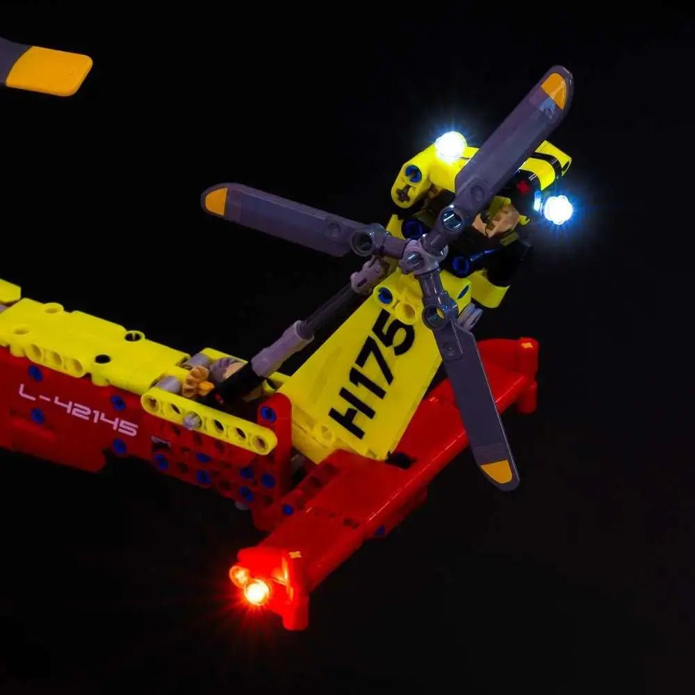 LEGO® Technic Airbus H175 Rescue Helicopter #42145 side angle with lights on, with the RGB LED light kit