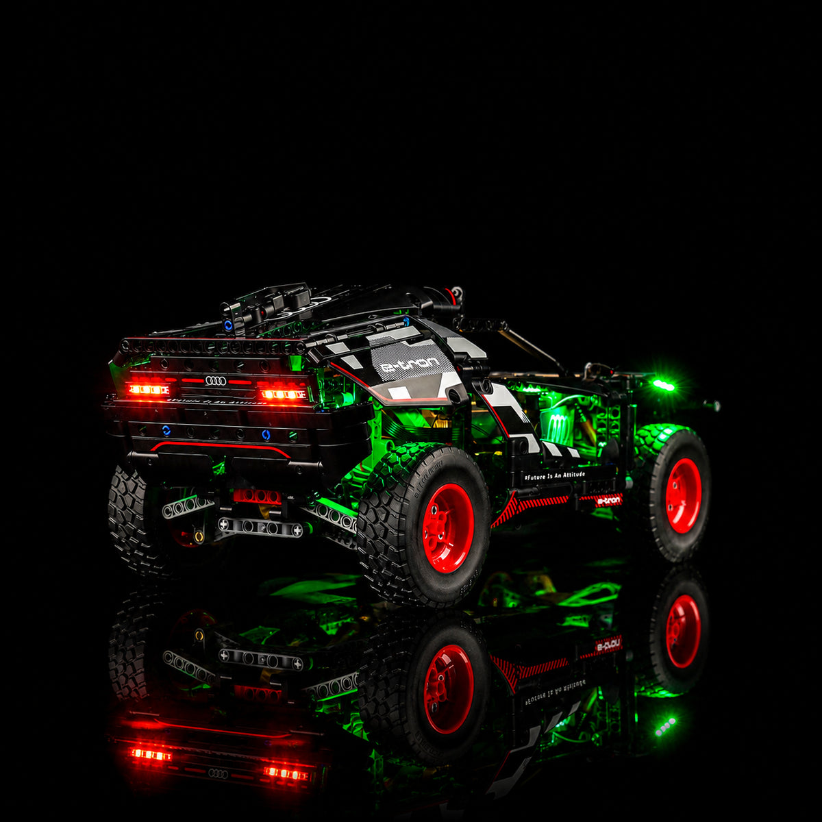 LEGO® Technic Audi RS Q e-tron #42160 fully illuminated on display, with the light kit
