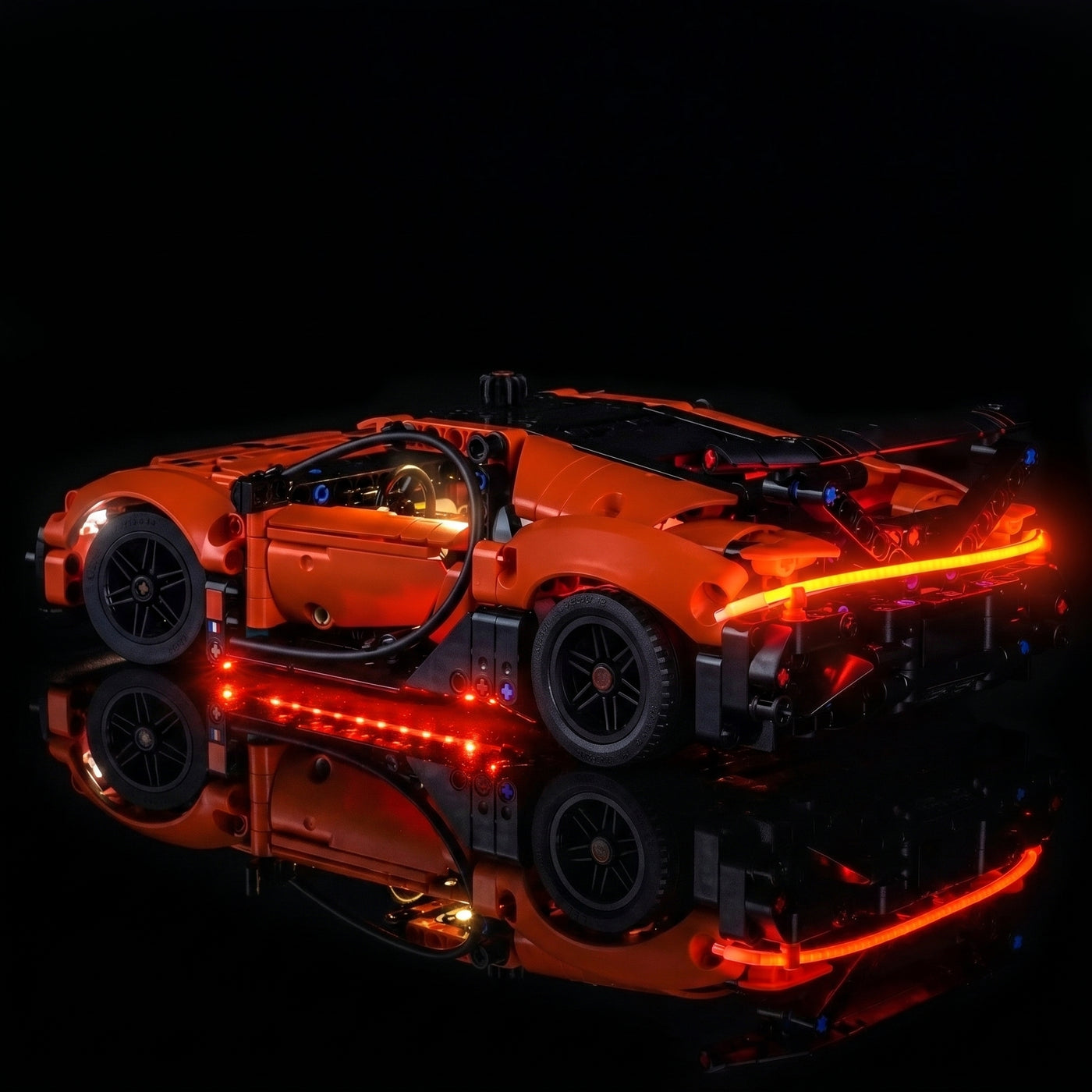 side angle with lights on: Bright My Bricks custom LED lighting for LEGO® Technic Bugatti Chiron Pur Sport Hypercar #42222
