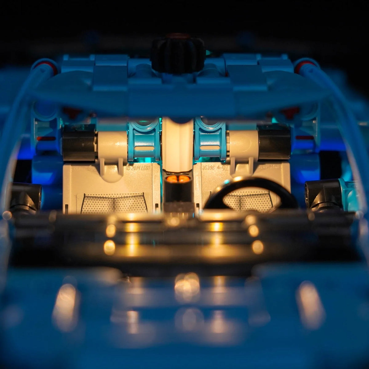 LEGO® Technic Chevrolet Corvette Stingray Blue #42217 — fully illuminated on display (light kit)
