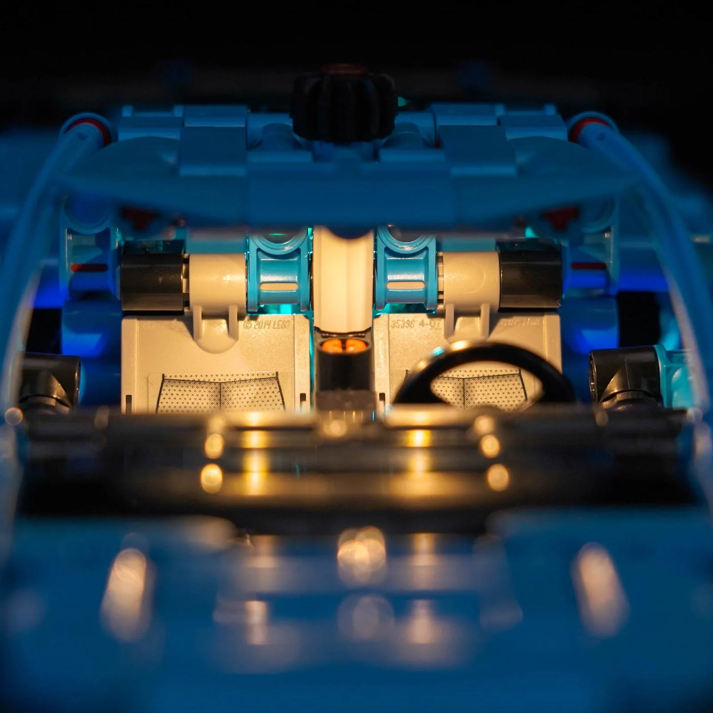 LEGO® Technic Chevrolet Corvette Stingray Blue #42217 — fully illuminated on display (light kit)
