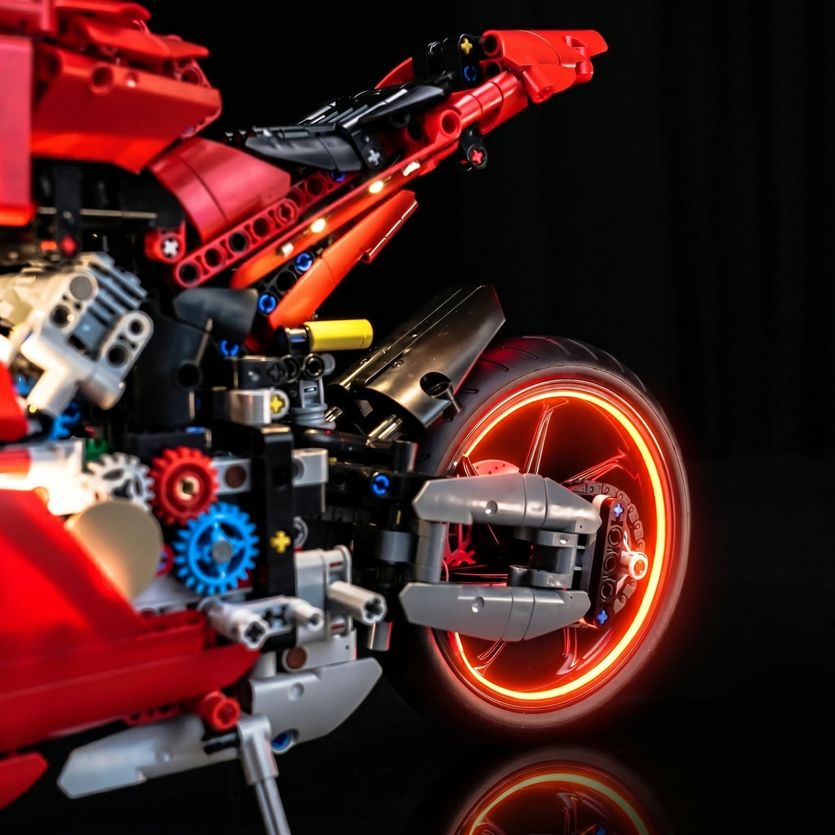 Bright My Bricks RGB LED light kit for LEGO® Technic Ducati Panigale V4 S Motorcycle #42202 — fully illuminated on display