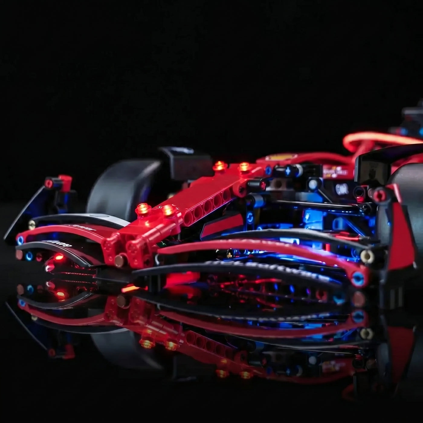 LEGO® Technic Ferrari SF-24 F1 Car #42207 before-and-after lighting, with the custom LED lighting