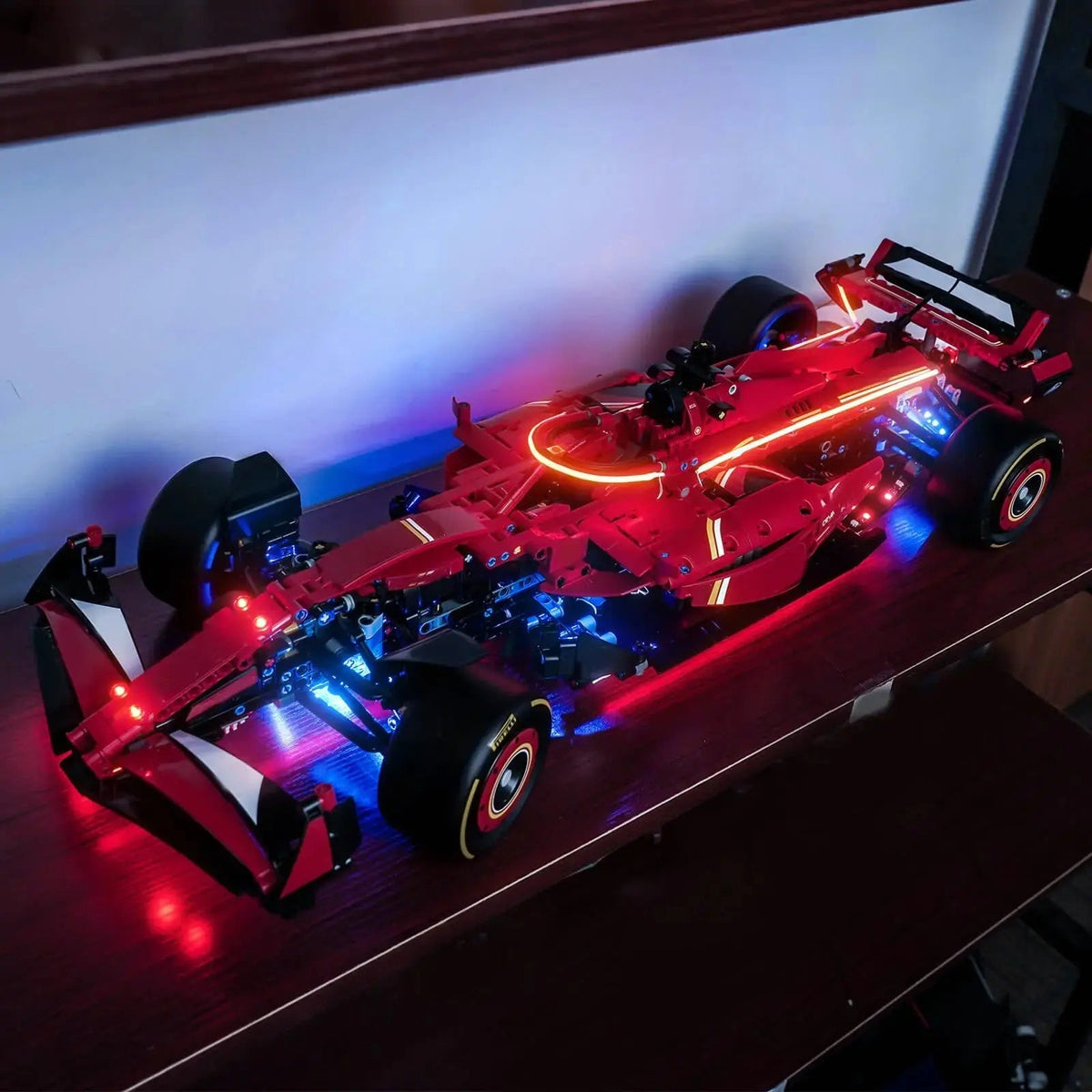 Bright My Bricks DIY LED light kit for LEGO® Technic Ferrari SF-24 F1 Car #42207 — side angle with lights on