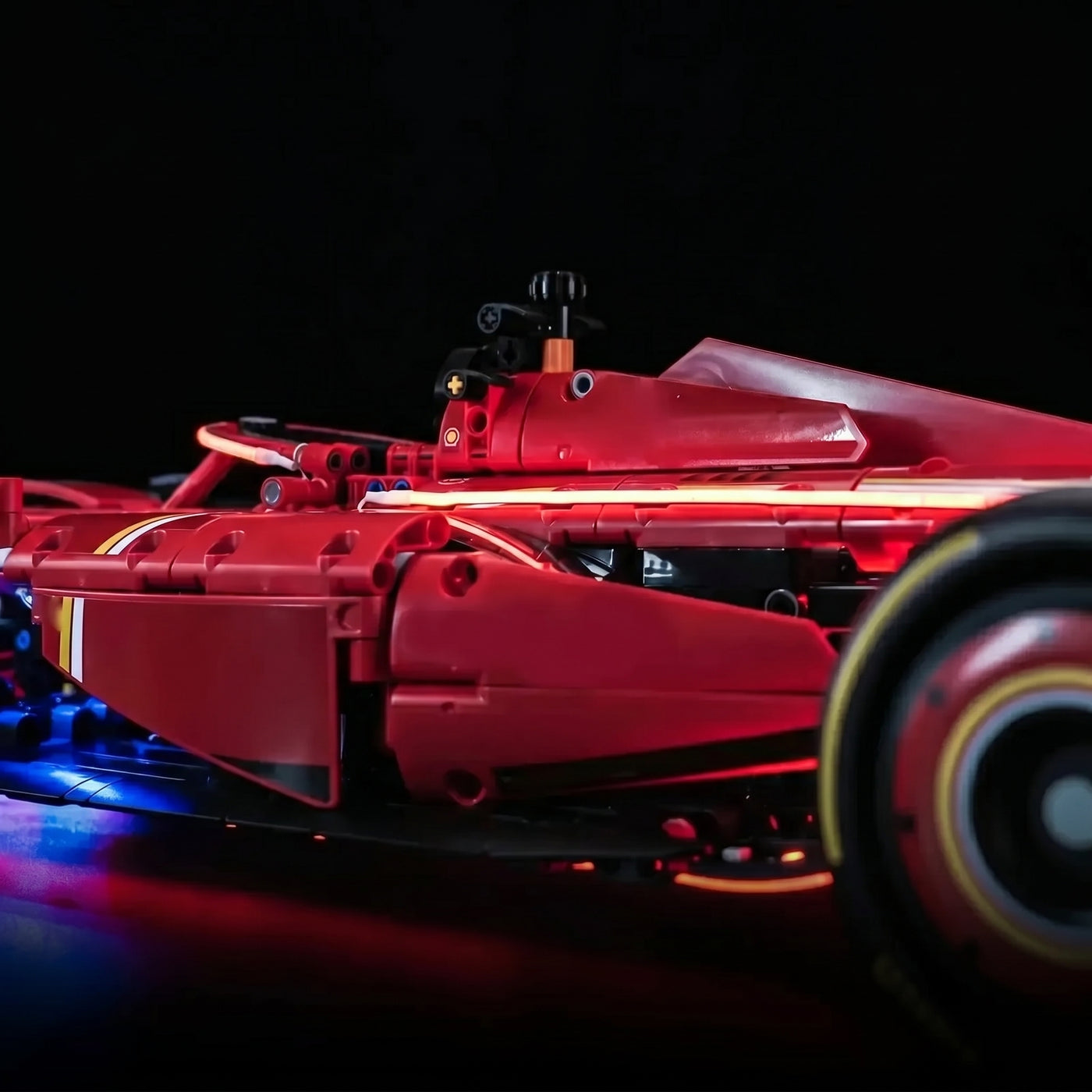 LEGO® Technic Ferrari SF-24 F1 Car #42207 close-up of the LED lighting detail, with the LED lights