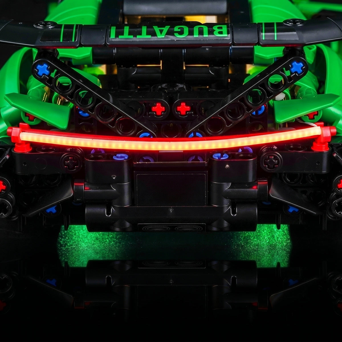 LEGO® Technic Green Bugatti Chiron Pur Sport Hypercar #42241 fully illuminated on display, with the DIY LED light kit