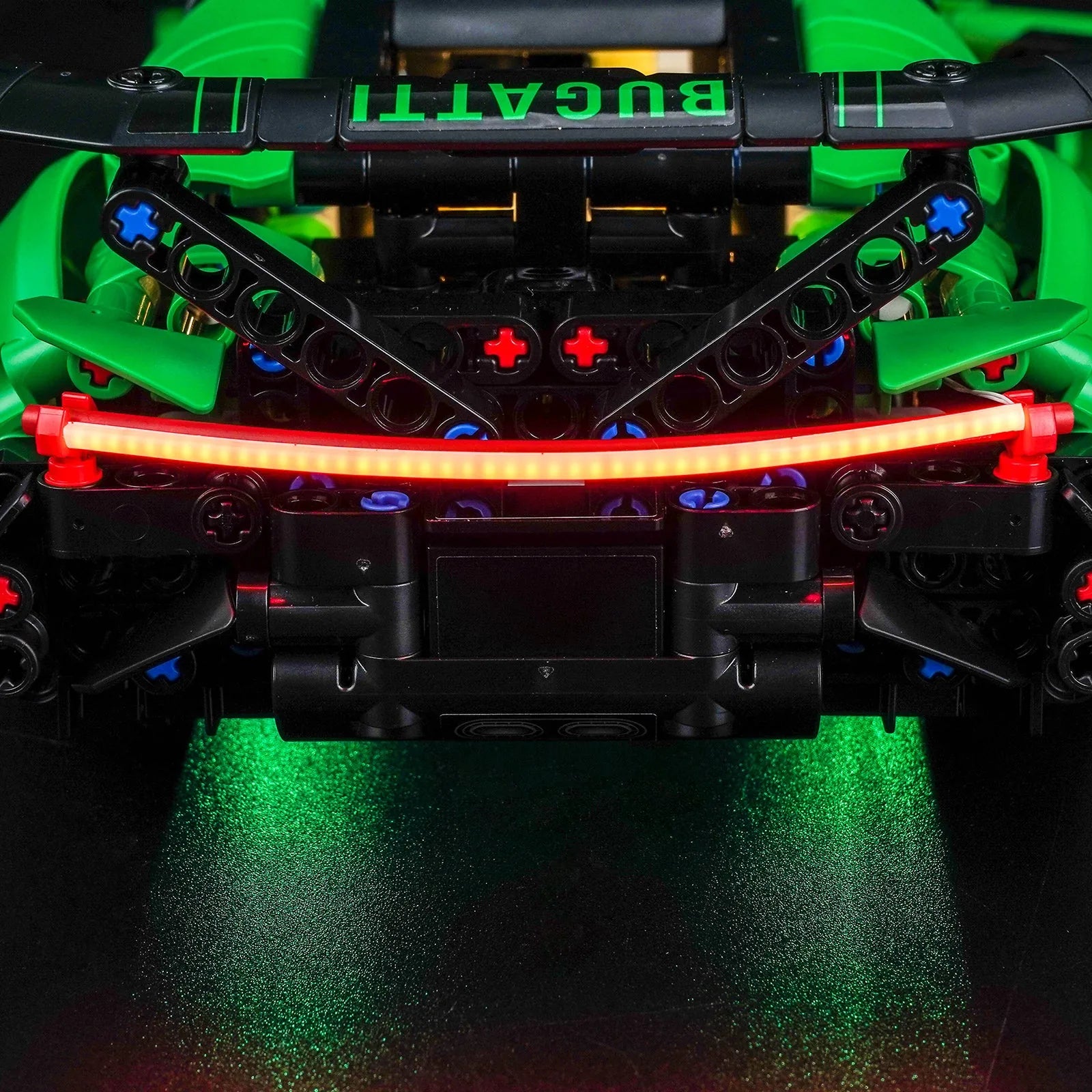 Close-up of LED lights on LEGO Technic Green Bugatti Chiron Pur Sport Hypercar #42241