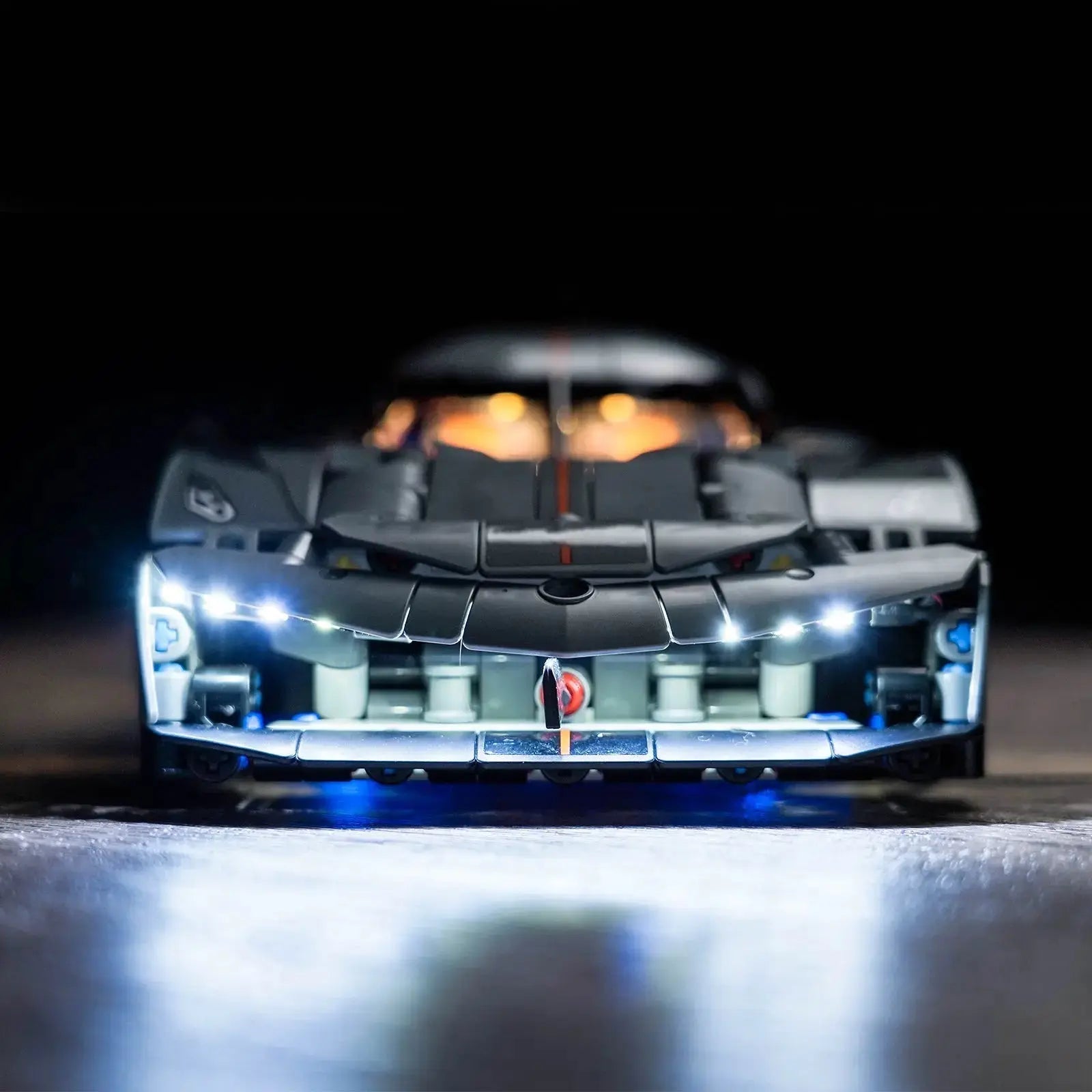 LEGO® Technic Koenigsegg Jesko Absolut Grey Hypercar #42173 brightened interior detail, with the USB-powered LED light kit