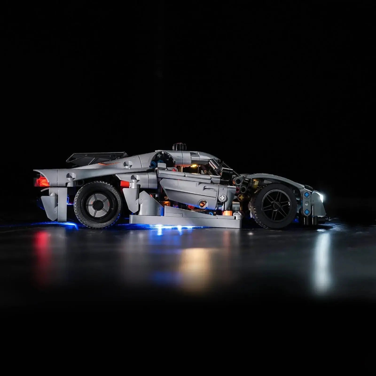 LED light kit for LEGO® Technic Koenigsegg Jesko Absolut Grey Hypercar #42173, fully illuminated on display