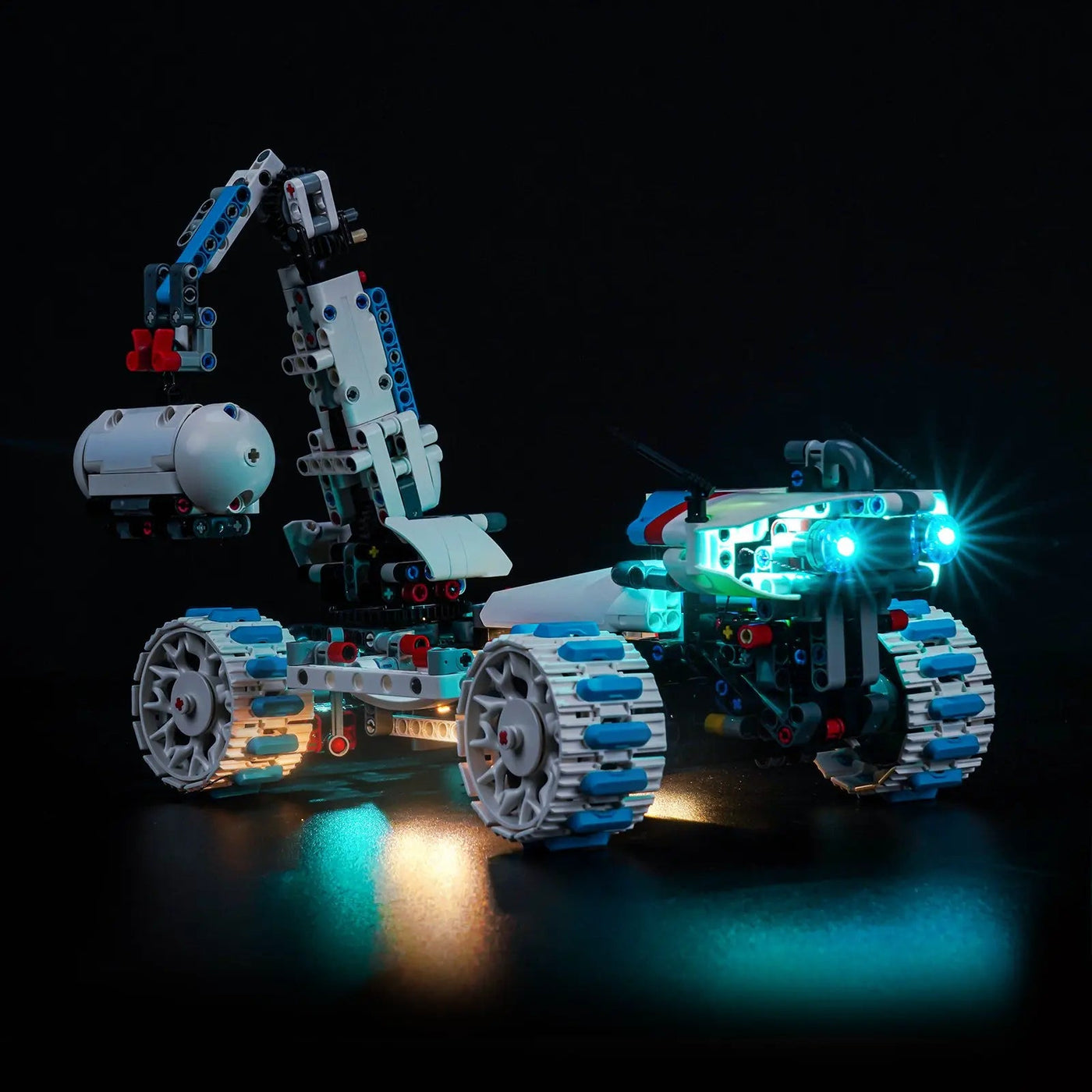 LEGO® Technic Lunar Outpost Moon Rover Space Vehicle #42211 side angle with lights on, with the LED light kit
