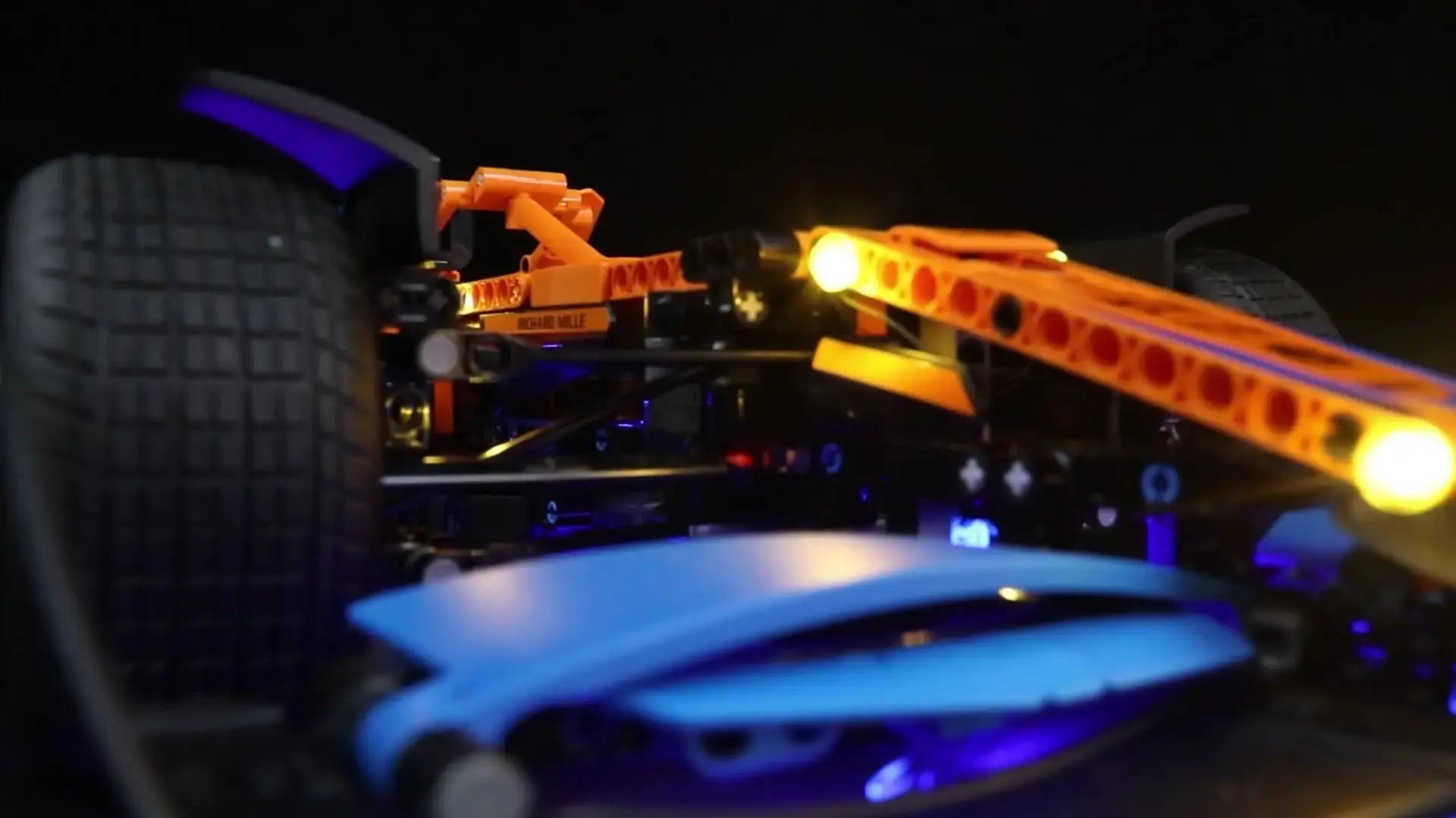 premium LED light kit for LEGO® Technic McLaren Formula 1 Race Car #42141, installed and glowing