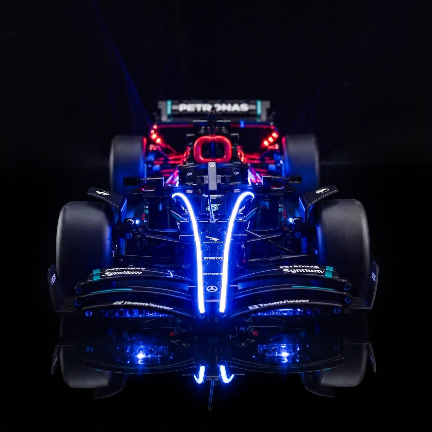 LEGO® Technic Mercedes-AMG F1 W14 E Performance #42171 — side angle with lights on (display light kit)